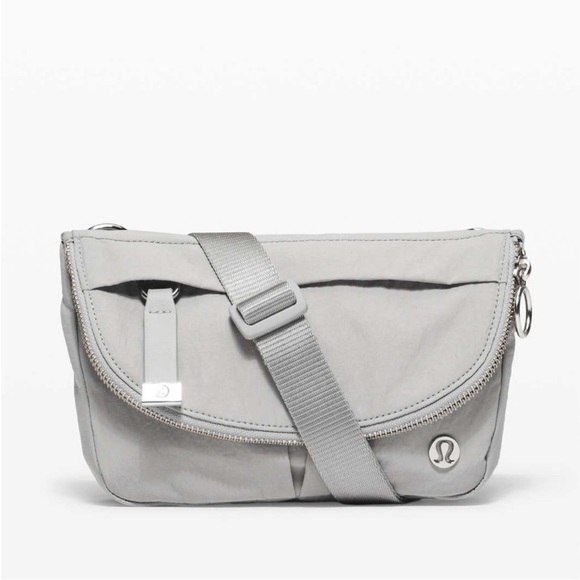 lululemon athletica Handbags - Lululemon All Night Festival Bag Mini 2L Silver Blue Grey